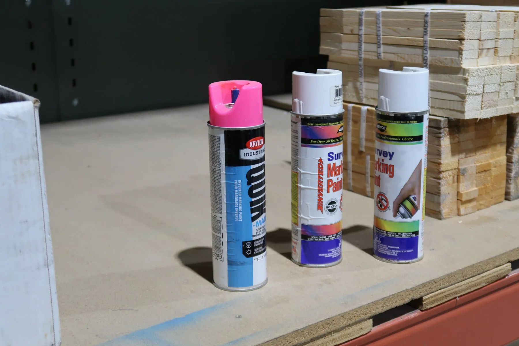 Survey marking paint staged on a shelf at the CLI facility